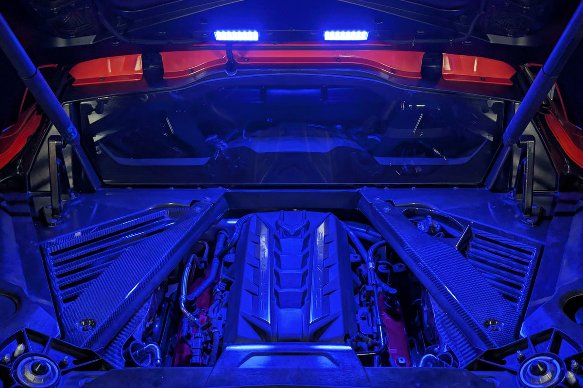 Corvette C8 engine bay lit in blue by the Boosted Lighting Solutions Engine Bay Lighting Kit