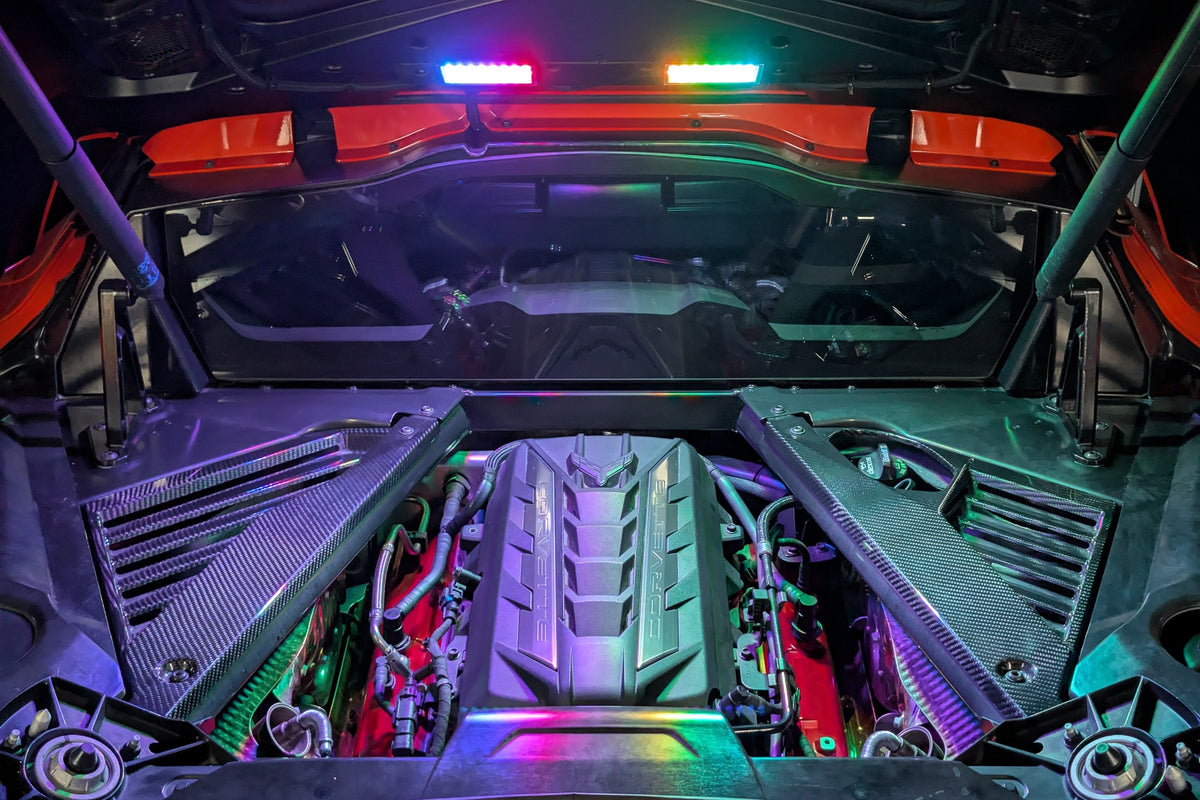 Corvette C8 engine bay lit in multiple colours at once by the Boosted Lighting Solutions Engine Bay Lighting Kit