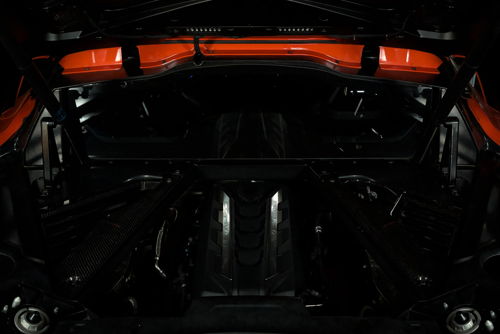 Corvette C8 engine bay with the Boosted Lighting Solutions kit switched off, showing a clean factory engine bay